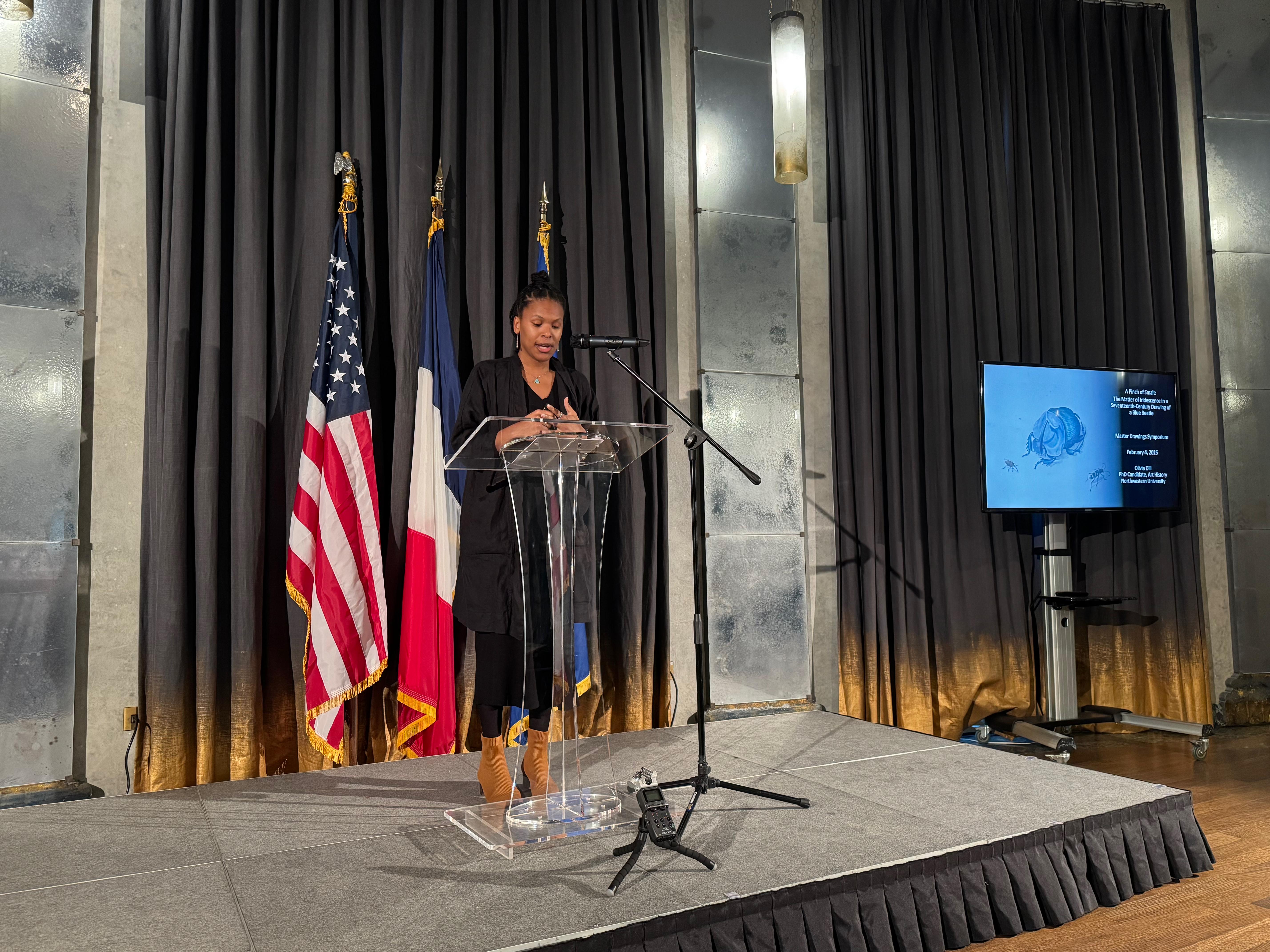 Olivia Dill giving a presentation.